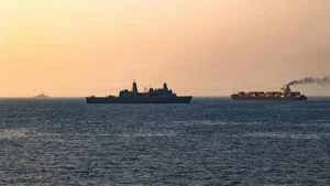 Smoke rises after US airstrikes targeting IRGC facilities in Iran.