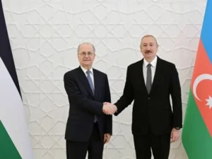 President Ilham Aliyev and Palestinian Prime Minister Mohammed Mustafa during an official meeting.