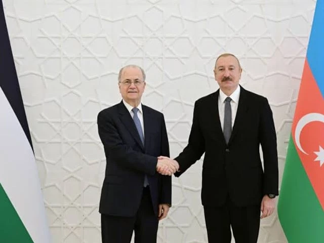 President Ilham Aliyev and Palestinian Prime Minister Mohammed Mustafa during an official meeting.
