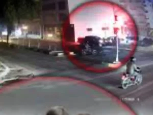 Police inspect the scene where a speeding SUV struck a family sleeping on a footpath in Karachi.