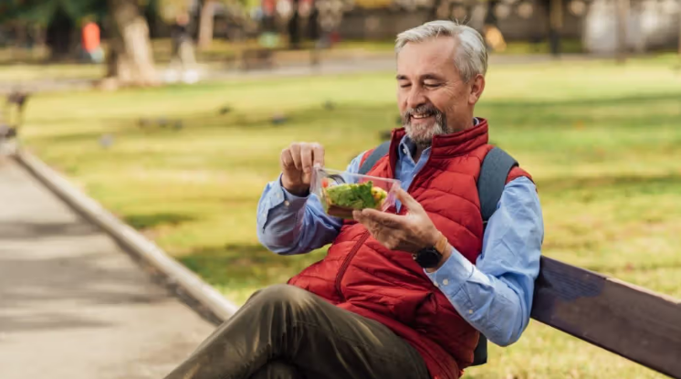 Person following a time-restricted eating schedule as part of a weight loss plan.