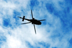 Rescue personnel at the site of a fatal helicopter crash in Argentina.