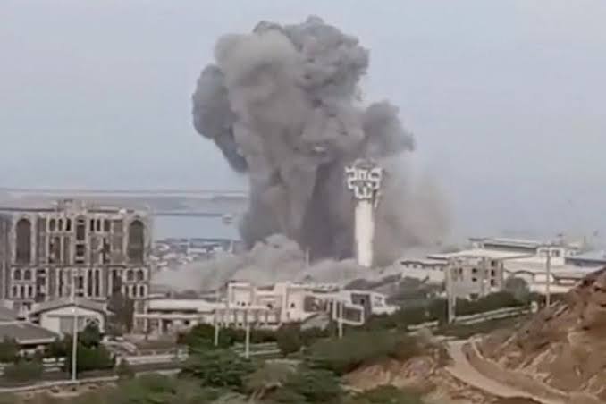 Smoke billows following US air strikes on Iranian military sites as tensions escalate across the Middle East.