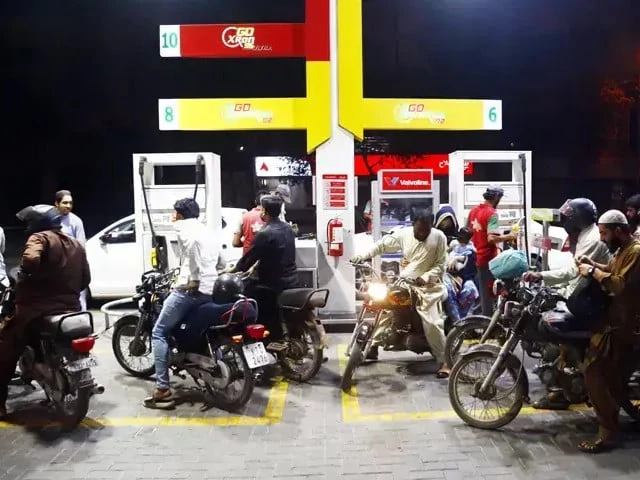 Cargo trucks on a highway carrying goods as transporters raise freight charges following daily fuel price revisions.