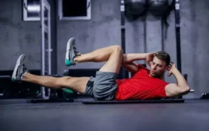 A man performs a high-intensity workout to improve fitness after age 30.