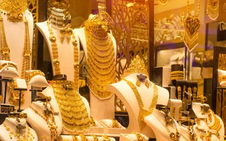 Gold bars and jewellery displayed as gold prices increase in Pakistan.