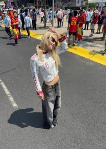 Fans wearing customized game day outfits inspired by football and basketball events