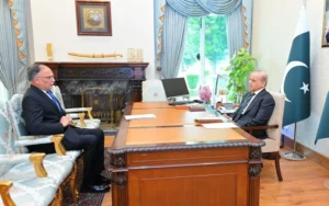 Prime Minister Shehbaz Sharif meets Planning Minister Ahsan Iqbal to review PSDP development projects in Islamabad.