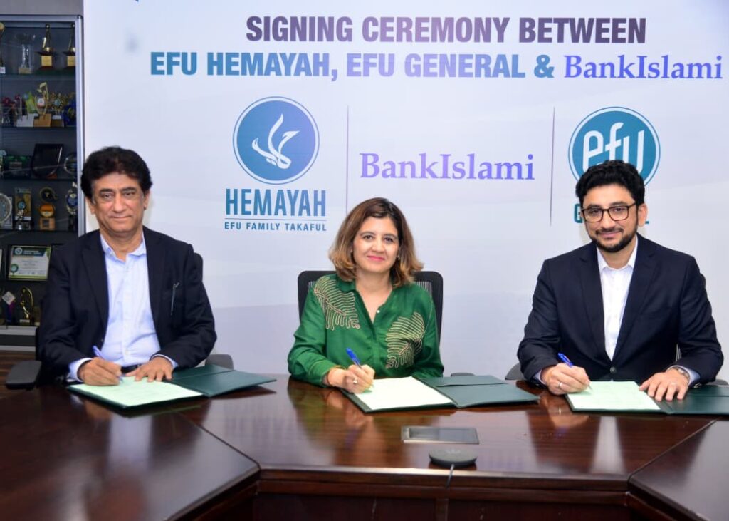 BankIslami and EFU officials at the microtakaful partnership signing ceremony.