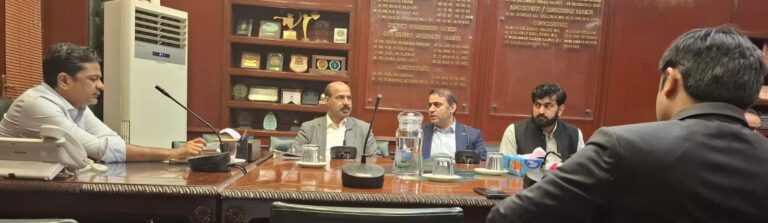 Karachi Price Control meeting chaired by Commissioner Syed Hassan Naqvi to review enforcement and anti-polio campaign.