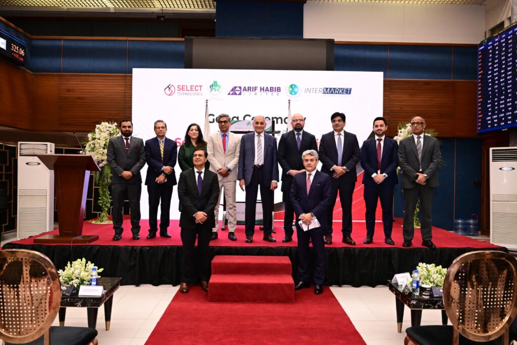 Select Technologies executives at the Pakistan Stock Exchange following the successful Rs3.02 billion IPO listing.