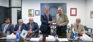 Faysal Bank leadership and LUMS officials during the presentation of a donation for the National Outreach Programme at the university campus.