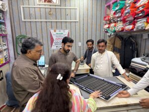 Women assemble solar inverters at a PPRP-supported manufacturing facility in Ghotki, Sindh.