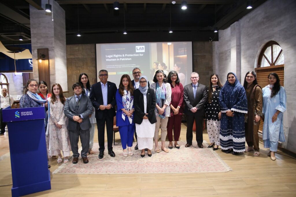 Employees attend a women's rights and legal awareness session hosted by Standard Chartered Pakistan and the Legal Aid Society.