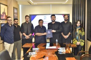 Representatives of foodpanda and D.Watson sign a partnership agreement for healthcare delivery services.