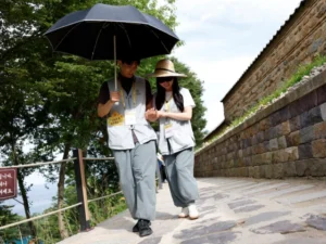 Young participants join a Buddhist temple matchmaking retreat at Naksansa Temple.