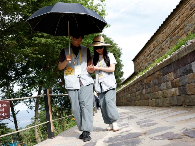 Young participants join a Buddhist temple matchmaking retreat at Naksansa Temple.