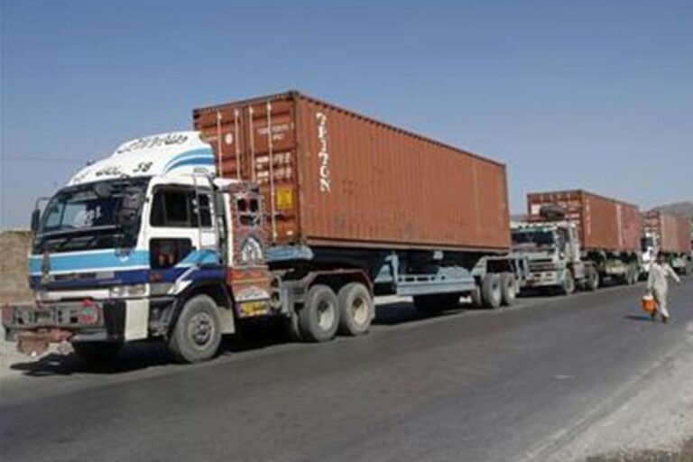 Trucks and public transport vehicles operating after Pakistan's fuel price hike.