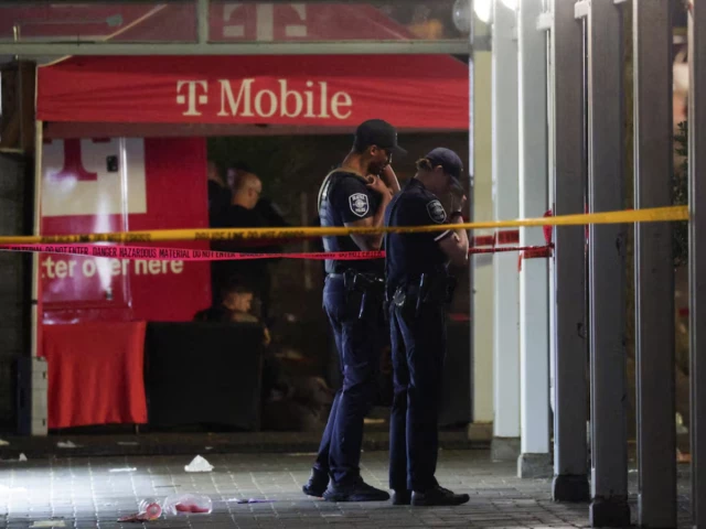 Emergency responders at the scene of the Seattle food festival shooting.