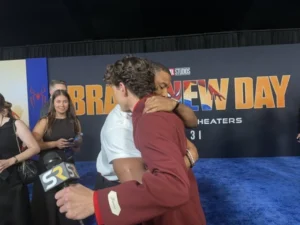 Michael B. Jordan posing on the red carpet at the Spider-Man: Brand New Day premiere in Los Angeles.
