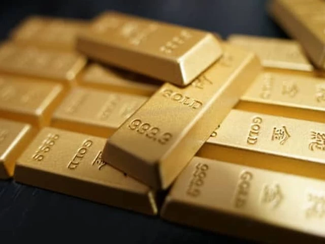 Gold bars and jewellery at a bullion market following a decline in international and Pakistan gold prices.