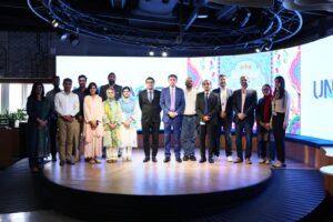 Competition Commission of Pakistan officials addressing employees at Unilever Pakistan's head office.