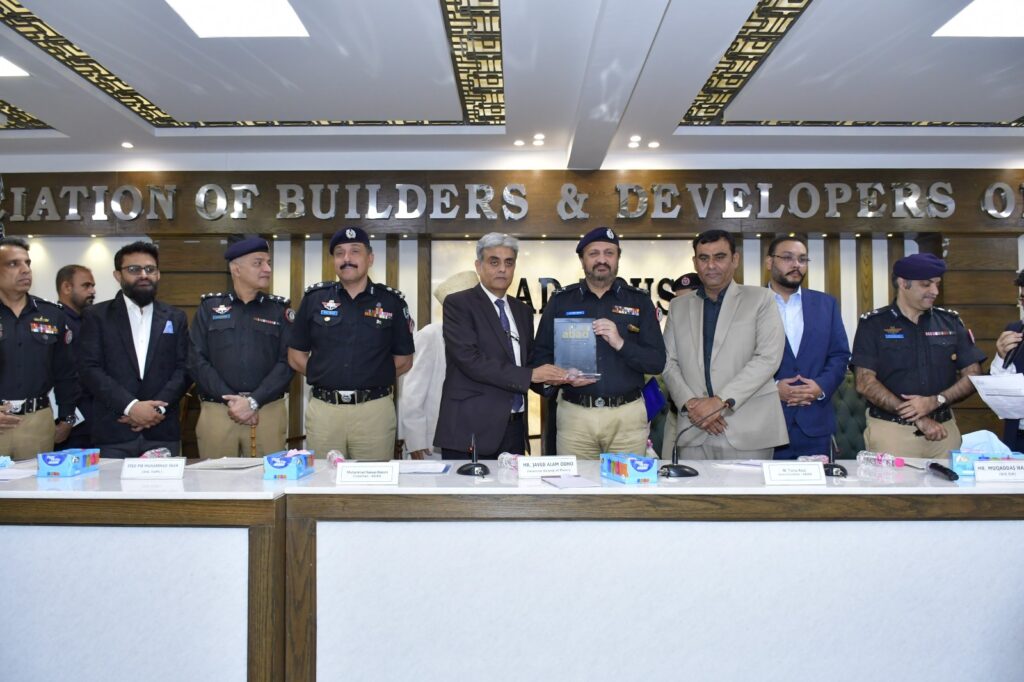 Javed Alam Odho addressing ABAD members during a meeting in Karachi