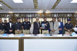 Javed Alam Odho addressing ABAD members during a meeting in Karachi