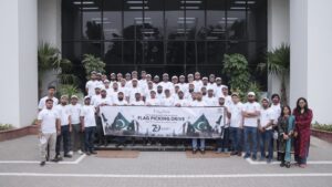 IMC employees collecting national flags during a Karachi volunteer drive