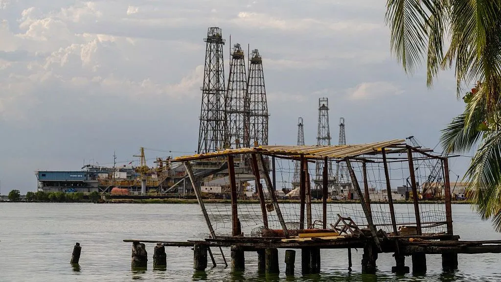 Donald Trump and Venezuela oil fields amid a major US energy agreement.