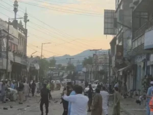 Rescue workers and police at the site of the Swat blast outside Kabal police station in Khyber-Pakhtunkhwa