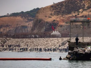 Spanish security forces patrol the coastline in Ceuta as rescue operations and migrant returns continue following the migration crisis.