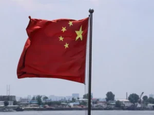 Chinese President Xi Jinping speaks as China defends its economic model amid growing global trade tensions.