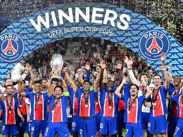 PSG players celebrate their 2-1 UEFA Super Cup victory over Aston Villa in Salzburg.