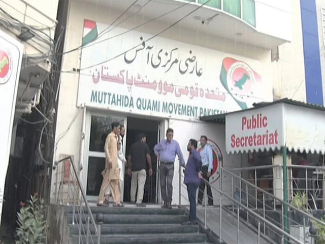 MQM-P workers outside the Bahadurabad headquarters following clashes between rival party factions in Karachi.