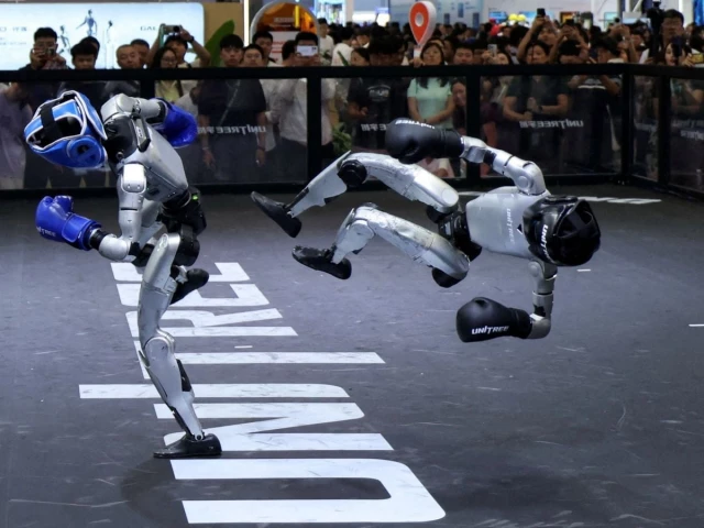 Chinese humanoid robots performing commercial tasks at World Robot Conference