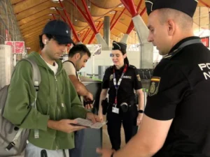 Spanish authorities conduct border checks on travellers arriving from Italy amid migration tensions.