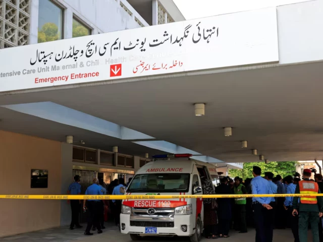 Firefighters responding to the PIMS Hospital nursery fire in Islamabad that killed 14 newborn babies.