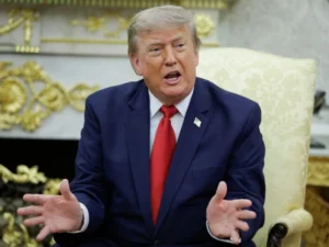 US President Donald Trump signs new executive orders on birthright citizenship in the Oval Office.