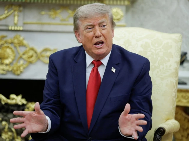 US President Donald Trump signs new executive orders on birthright citizenship in the Oval Office.