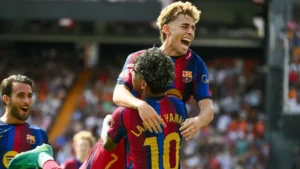 Barcelona players celebrate during their 5-0 win over Valencia in La Liga