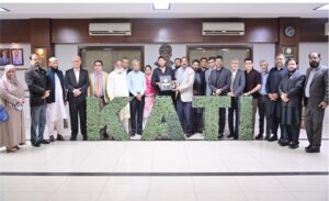 KATI President Muhammad Ikram Rajput presents shield to Shahid Afridi at welfare MoU ceremony