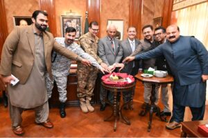 Governor Sindh Nehal Hashmi cuts cake for Shehbaz Sharif birthday at Governor House