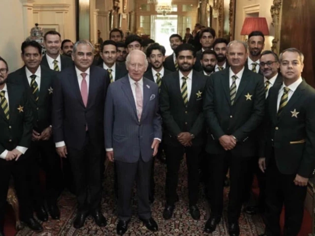 Babar Azam presents a signed cricket bat to King Charles III at Clarence House