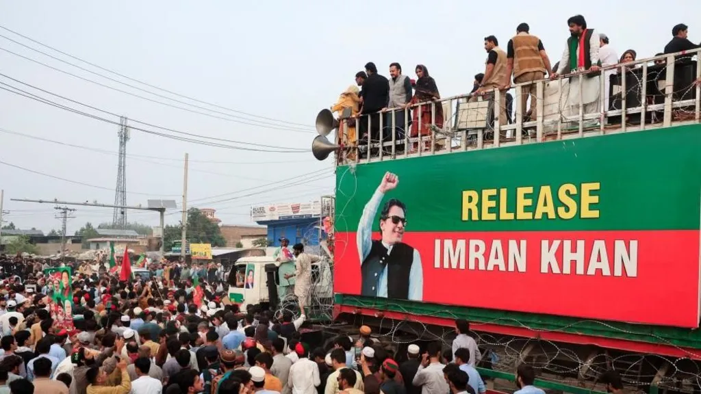 Security personnel and protesters amid political unrest in Khyber Pakhtunkhwa, Pakistan.