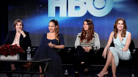Lena Dunham, Jemima Kirke, Zosia Mamet and Allison Williams seated together at an HBO event.