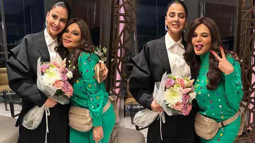 Saba Qamar and Rakhi Sawant smiling and interacting during their Dubai meeting.