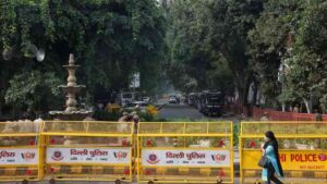 - Police and security personnel in Delhi during protests over India’s voter list revision.