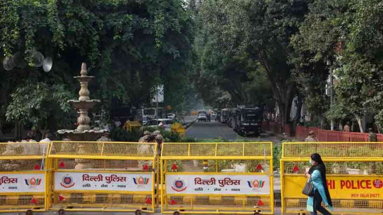- Police and security personnel in Delhi during protests over India’s voter list revision.