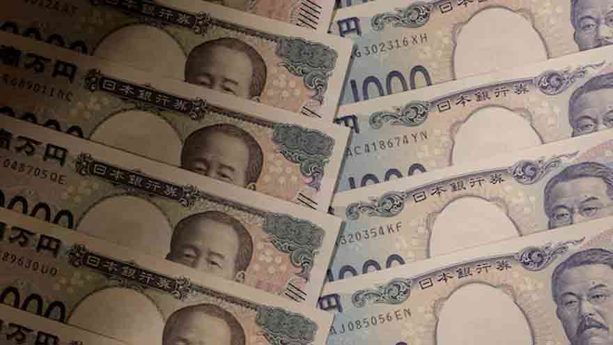 Japanese yen and US dollar banknotes representing foreign exchange market movements.